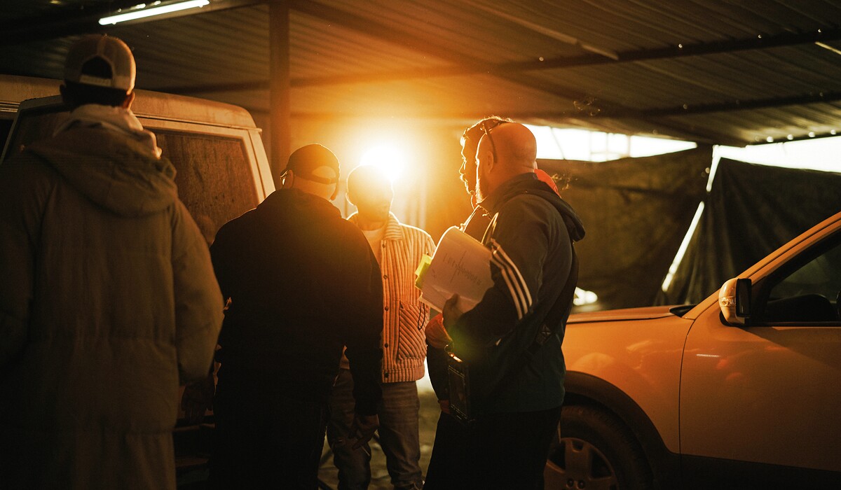 MSM representatives meeting with customers inside an automotive shop